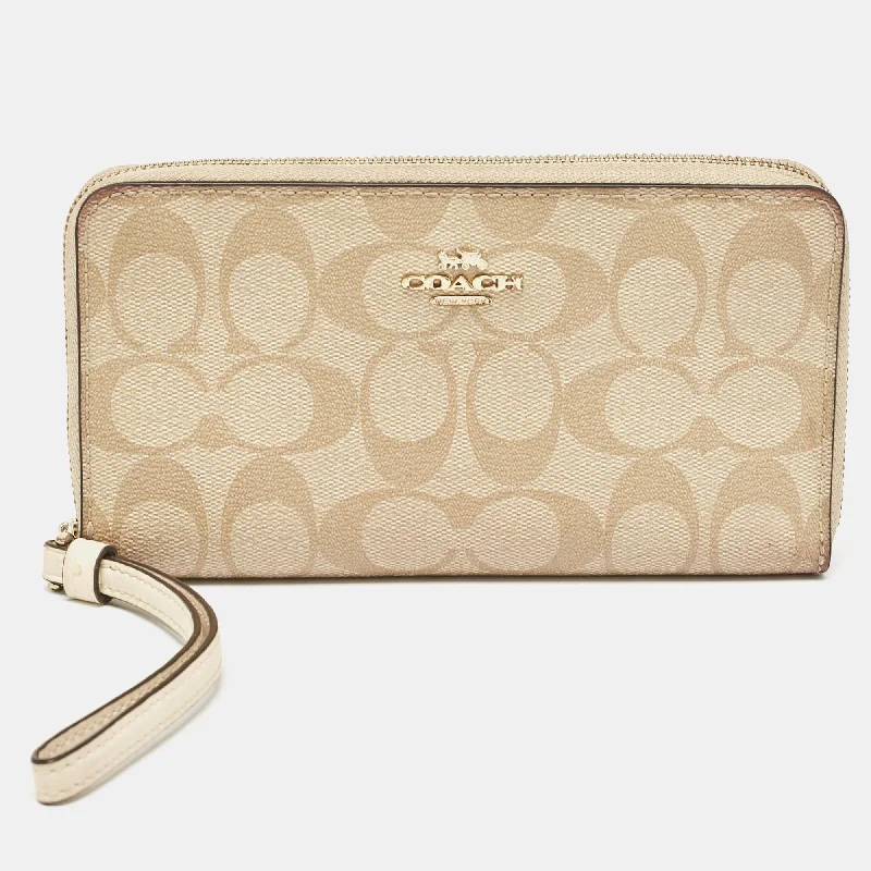 keychains with sleek appeal-Coach Beige Siganture Coated Canvas And Leather Zip Around Wristlet Wallet