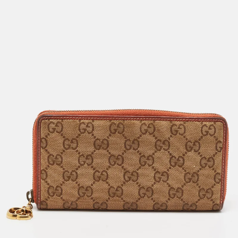 wallets for daily appeal-Gucci Beige/orange Gg Canvas And Leather Gg Twins Zip Around Wallet