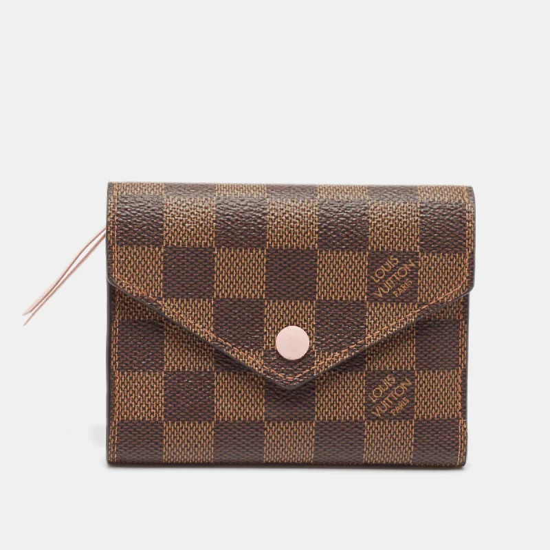 keychains with durable appeal-Louis Vuitton Damier Ebene Canvas Victorine Wallet